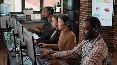 Diverse team of people talking to clients on phone helpline