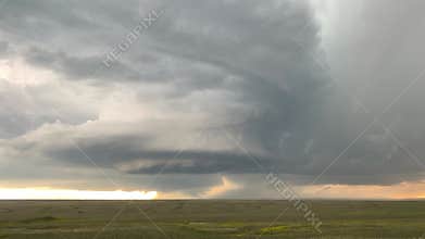 Supercell storm clouds and lightning bolt