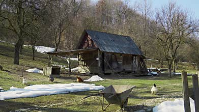 Old abandoned wooden house in a mountain village.