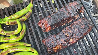 Video footage barbecue ribs being cooked on the grill