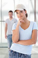 Teenage girl in baseball cap