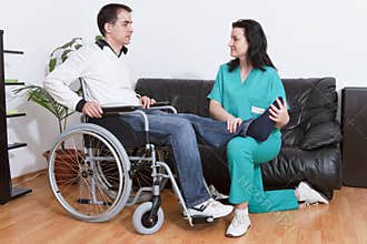 Physical therapist working with patient
