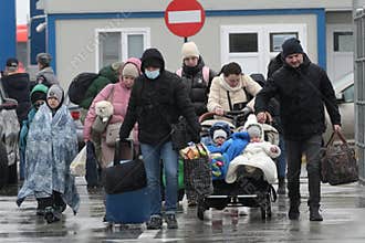 Isaccea, Romania. 02 March, 2022. Refugee Ukrainians walk from Ukraine to Romania after crossing the border