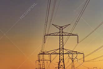 High voltage pylons. Concept for technology and industry. Rising energy prices - further rising electricity and energy prices -
