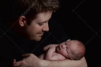 A man holding an infant