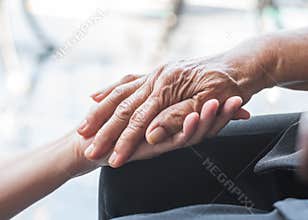 Disability awareness day and aging society concept with Parkinson disease patient or elderly senior person in support of nursing