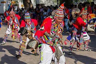 Men dancing at the festival of indigenous people in South America, north Chile