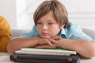 Little boy at school class