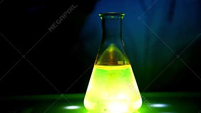 Photochemical reaction performed by a European woman scientist in a chemistry laboratory under UV light in 4K