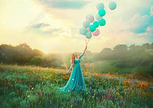 Happy woman walks in blooming valley. Fantasy girl princess holding in hand ball air balloon. long blue tulle fashion