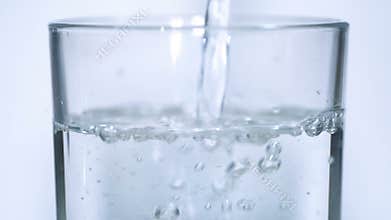 Transparent Water glass pouring slow motion,healthy drinking wellness lifestyle