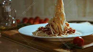 Spaghetti alla carbonara with cheese and tomato and meat sauce