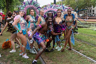 Group picture of colorful disguised troop at Rotterdam festival 2019