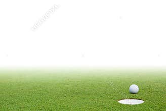 Golf ball and green grass