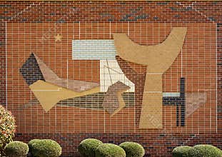 Abstract brick relief on the outside wall of a building at the Texas Woman`s University in Denton.