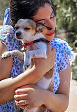 A girl with her beloved dog.