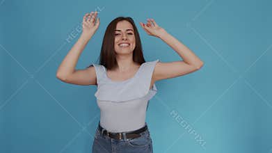 Playful dances of young girl with chic smile