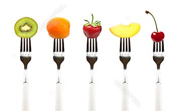 Raw Food. Fruits on forks