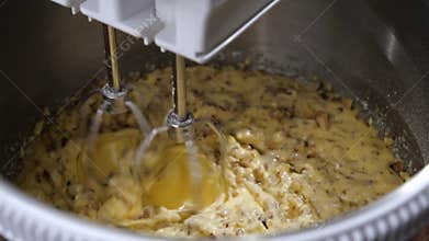 Homemade peanut pie dough using an electric mixer.