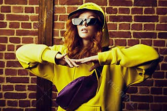 Girl in yellow hoodie