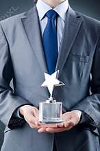 Businessman with star award
