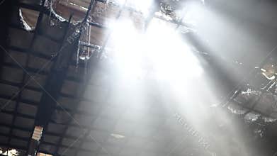 Demolished ruined ceiling of abandon building light through dusty architecture hope abstract