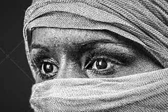 Face covered with scarf