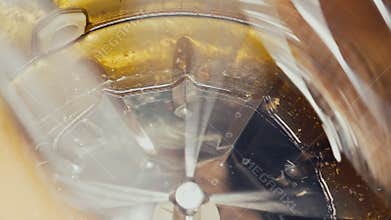 Honey Manual Extracting In Metal Barrel Centrifuge. Frames Rotating, Apiarist pumping, getting organic nectar from