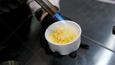 Creme brulee in Catalan style. Vanilla cream with burnt sugar on top, dessert