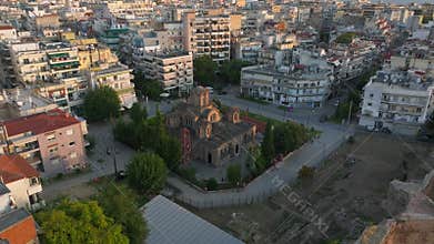 Camera panning over the city of Thessaloniki, Greece. Church of Holy Apostles and archeological ruins are surrounded by