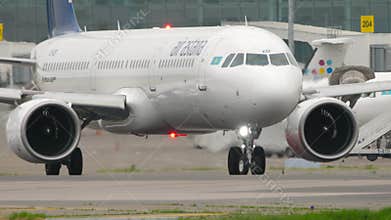Airbus A321 of Air Astana taxiing