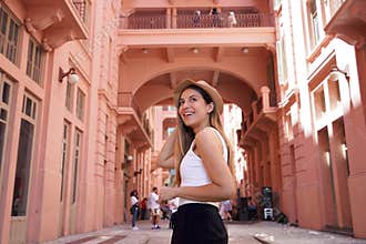 Portrait of young woman visiting the historic palace Casa de Cultura Mario Quintana in Porto Alegre, Brazil