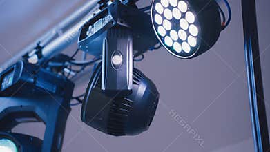 A device for lighting effect used at concerts. Night club or other event, concert. Spotlights of light music.