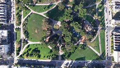 Aerial view of Alamo Square Park in San Francisco, showcasing the lush greenery and iconic Victorian houses