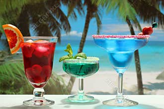 Alcoholic cocktails with fruit on the beach
