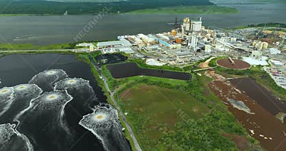 Aeration pond at cellulose and paper plant in Brunswick GA. Poisonous influence of manufacturing industry on environment