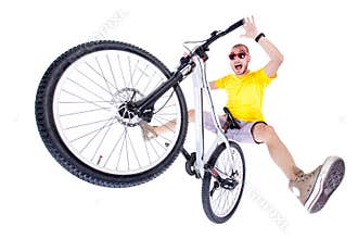 Crazy boy on a dirt jump bike isolated on white - wide shot