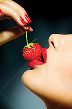 Woman Eating Strawberry