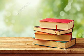 Old vintage books over bokeh background