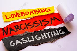 Word Narcissism on red surface.