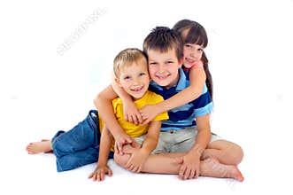 Happy kids sharing a hug