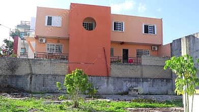 Orange buildings architecture hotels apartments palm Playa del Carmen Mexico