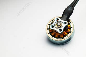 Close-up Small brushless electric motor for drone. Extreme macro photography.
