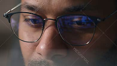 Close up businessman in eyeglasses working with computer data crypto analyzing cropped view male eyes in glasses looking