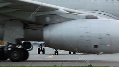 Passengers airliners and service cars ride in