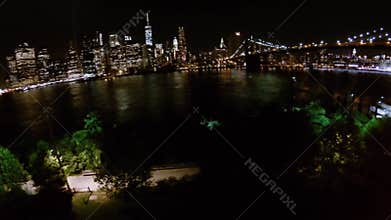 Panorama with illuminated Manhattan and Brooklyn