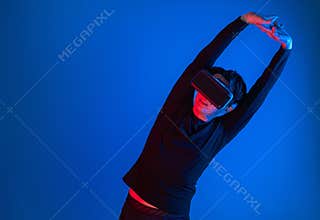 Smart sportman player wearing VR stretching whole body posing. Contrivance.