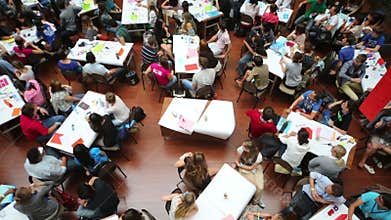 Students at the tables on the international Youth