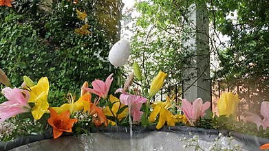 Egg dancing in a stream of water. The dancing egg (l\'ou com balla), a at Corpus Christi festivals.