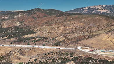 Pan Left Along Scenic Mountain Road Near Pyramid Lake, California